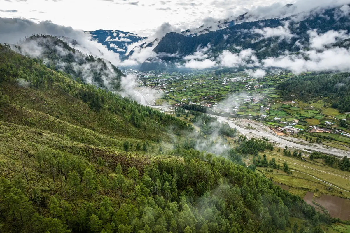 Haa Valley in Bhutan partially sheltered by mountain ridgelines during monsoon season