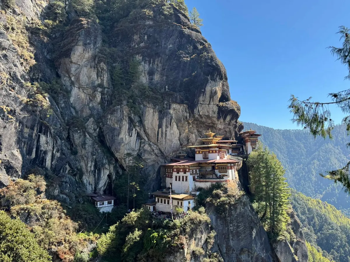 Tiger's Nest monastery clinging to the cliff face above the Paro valley, the reward waiting on the other side of Bhutan's visa process